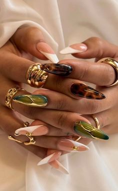 Angies Nail Bar — nail art with French tips, tortoiseshell, emerald green and gold accents
